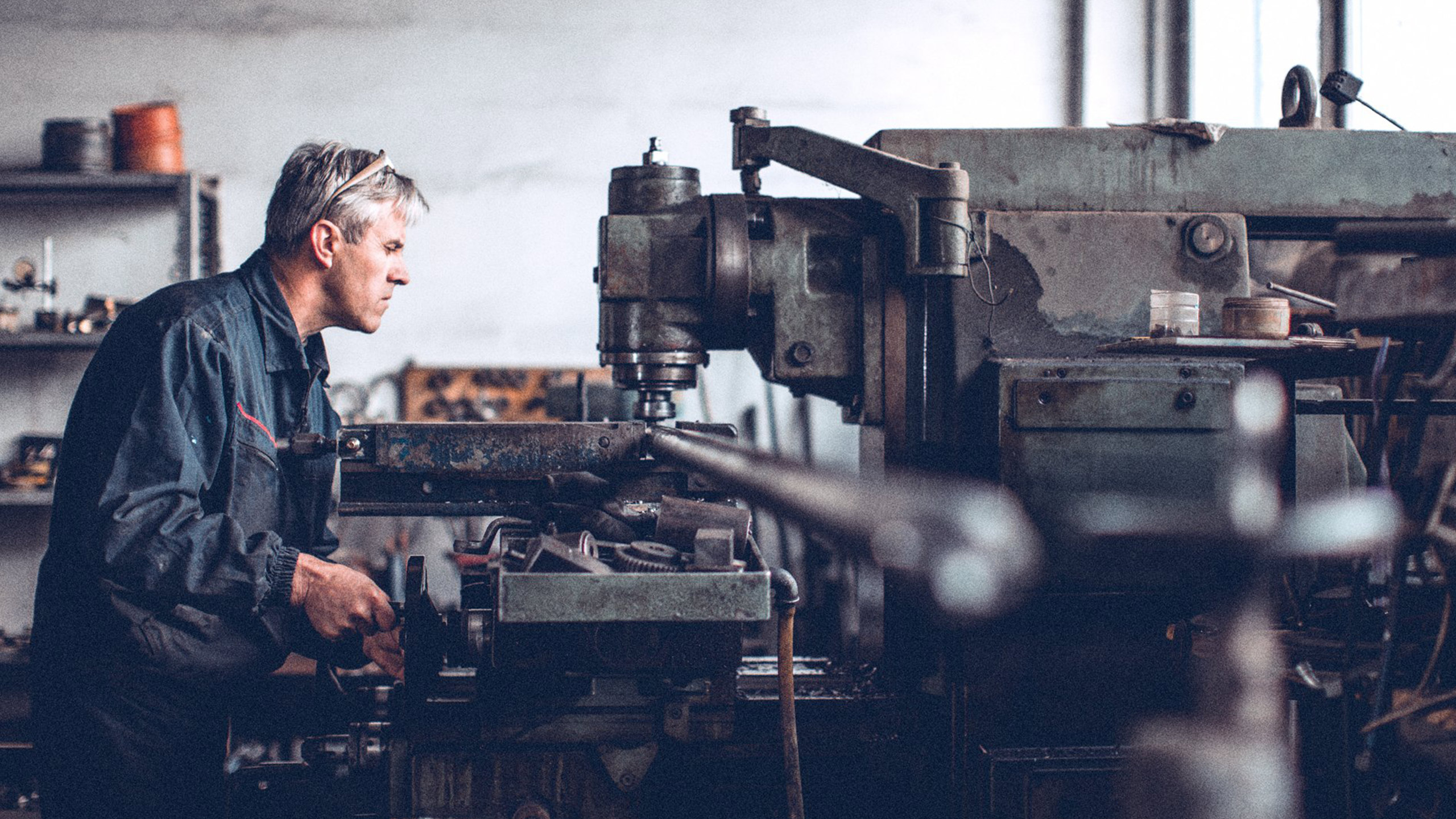 man working with steel